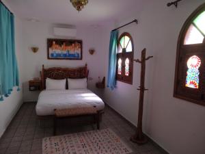 Voodi või voodid majutusasutuse Palacio Del Sol toas