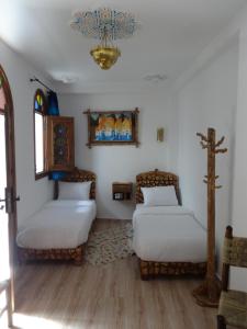 Voodi või voodid majutusasutuse Palacio Del Sol toas