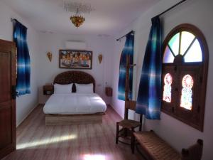 Voodi või voodid majutusasutuse Palacio Del Sol toas