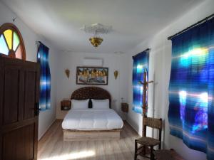 Voodi või voodid majutusasutuse Palacio Del Sol toas