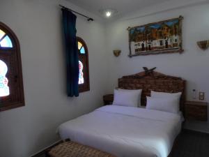 Voodi või voodid majutusasutuse Palacio Del Sol toas