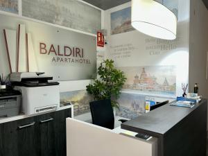 Kuchyň nebo kuchyňský kout v ubytování Apartahotel Baldiri