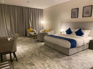 Postel nebo postele na pokoji v ubytování فندق سافوي جدة Savoye Hotel