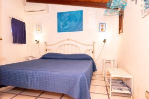 Posteľ alebo postele v izbe v ubytovaní Villa Jonny a due passi dal Mare