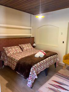 En eller flere senge i et værelse på Antonietta Hospedagem e Eventos - Conforto em pleno mar de morros de Cunha + 67 billeder