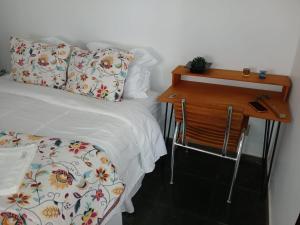 Vila do Tatá客房内的一张或多张床位