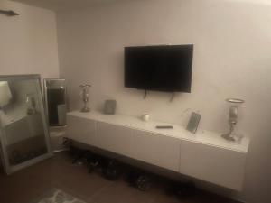 TV a/nebo společenská místnost v ubytování An Reimse