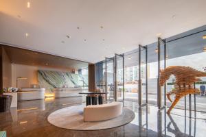 Posezení v ubytování Mehood Lestie Hotel Pazhou Convention and Exhibition Center Branch - Free Shuttle Bus to Canton Fair Complex During Canton Fair Period