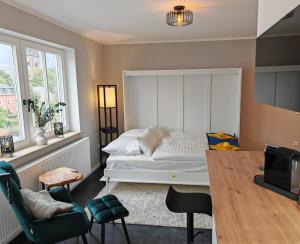 Ένα ή περισσότερα κρεβάτια σε δωμάτιο στο Sunnybelle Appartements Freital I