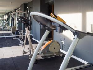 a gym with a treadmill and other machines at Two Independent Palermo Hollywood Studios at Buenos Aires's Best Neighborhood in Buenos Aires