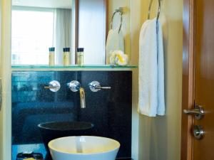 a bathroom with a sink and a mirror at Two Independent Palermo Hollywood Studios at Buenos Aires's Best Neighborhood in Buenos Aires +30 photos