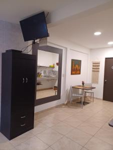 Η κουζίνα ή μικρή κουζίνα στο Charlys Place