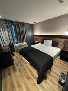 Postel nebo postele na pokoji v ubytování Hotel Mirage Brooklyn
