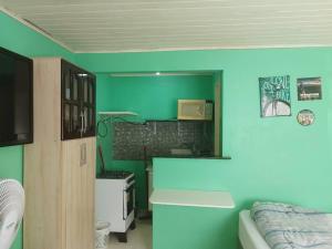 Casa central 74 com ótima localização客房内的一张或多张床位