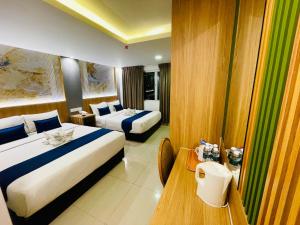 Voodi või voodid majutusasutuse ESSY Hotel KL Sentral toas
