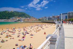 a large group of people on a beach at Borja el Marino in Balmaseda