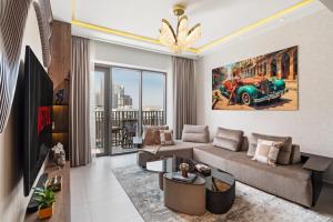 Μια τηλεόραση ή/και κέντρο ψυχαγωγίας στο Spacious Apartment - Dubai Creek Harbour by DuStay