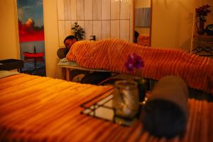 Postel nebo postele na pokoji v ubytování 360 Country Hotel