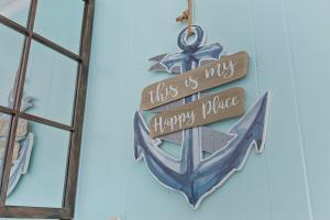 A Place At The Beach II - 1 block from the ocean的证书、奖牌、标识或其他文件