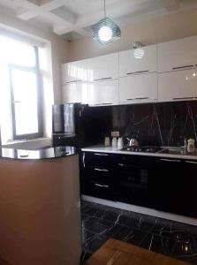 Η κουζίνα ή μικρή κουζίνα στο Maiko's home