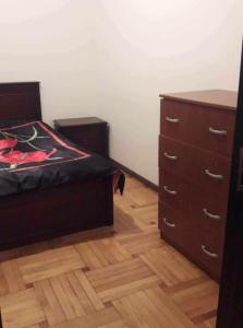 Ένα ή περισσότερα κρεβάτια σε δωμάτιο στο Maiko's home