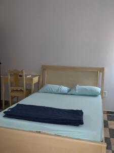 Postel nebo postele na pokoji v ubytování Hotel Potiguar