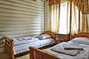 Letto o letti in una camera di Gotel Milenium
