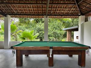 Τραπέζι μπιλιάρδου στο Ecoflat no Hotel Pedra Rodeadouro com duas suítes