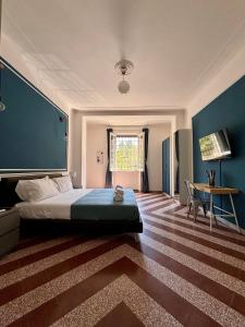 Letto o letti in una camera di The Place Strozzi