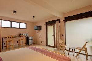 Μια τηλεόραση ή/και κέντρο ψυχαγωγίας στο Hotel Boutique Casa Bendición