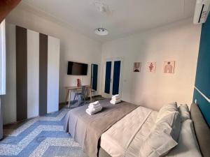 Letto o letti in una camera di The Place Strozzi