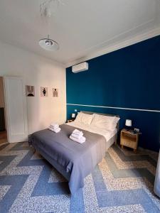 Letto o letti in una camera di The Place Strozzi