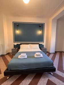 Letto o letti in una camera di The Place Strozzi