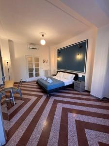 Letto o letti in una camera di The Place Strozzi