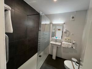 Koupelna v ubytování Hotel Neptuno
