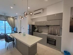 a kitchen with a large island in a room at Luxury Suite Lucentia BBCC Infinity Pool in Kuala Lumpur