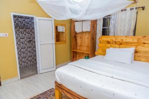 Katil atau katil-katil dalam bilik di Maili 6 Private Apartments +36 gambar