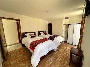 Letto o letti in una camera di Quito Basecamp - Adventure Hostel