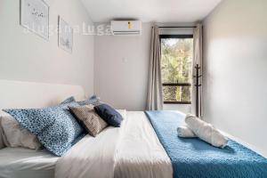 Ένα ή περισσότερα κρεβάτια σε δωμάτιο στο Premium One Flat Riviera Green +87 φωτογραφίες