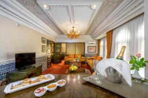 TV a/nebo společenská místnost v ubytování Hôtel Club Val d'Anfa Casablanca Ocean view