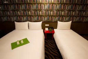 Voodi või voodid majutusasutuse Hotel 6 - ZhongHua toas
