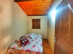 Postel nebo postele na pokoji v ubytování Chalé e Camping Elementais