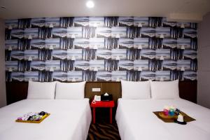 Voodi või voodid majutusasutuse Hotel 6 - ZhongHua toas