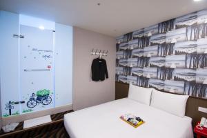 Voodi või voodid majutusasutuse Hotel 6 - ZhongHua toas