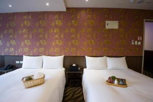 Voodi või voodid majutusasutuse Hotel 6 - ZhongHua toas