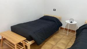 Postel nebo postele na pokoji v ubytování Ma Maison