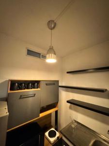 a kitchen with a stove with pots and pans at Barika in Guatemala