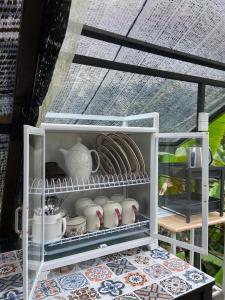 Kuchyň nebo kuchyňský kout v ubytování The Backyard Glamping Cameron Highlands