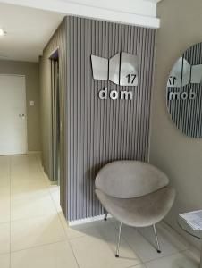 a chair sitting in a room with a wall at Departamento céntrico zona clínicas MIT - Nefrología in Santa Fe