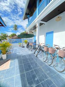 a row of bikes parked outside of a building at Sadakham Royal View Hotel 1 in Luang Prabang